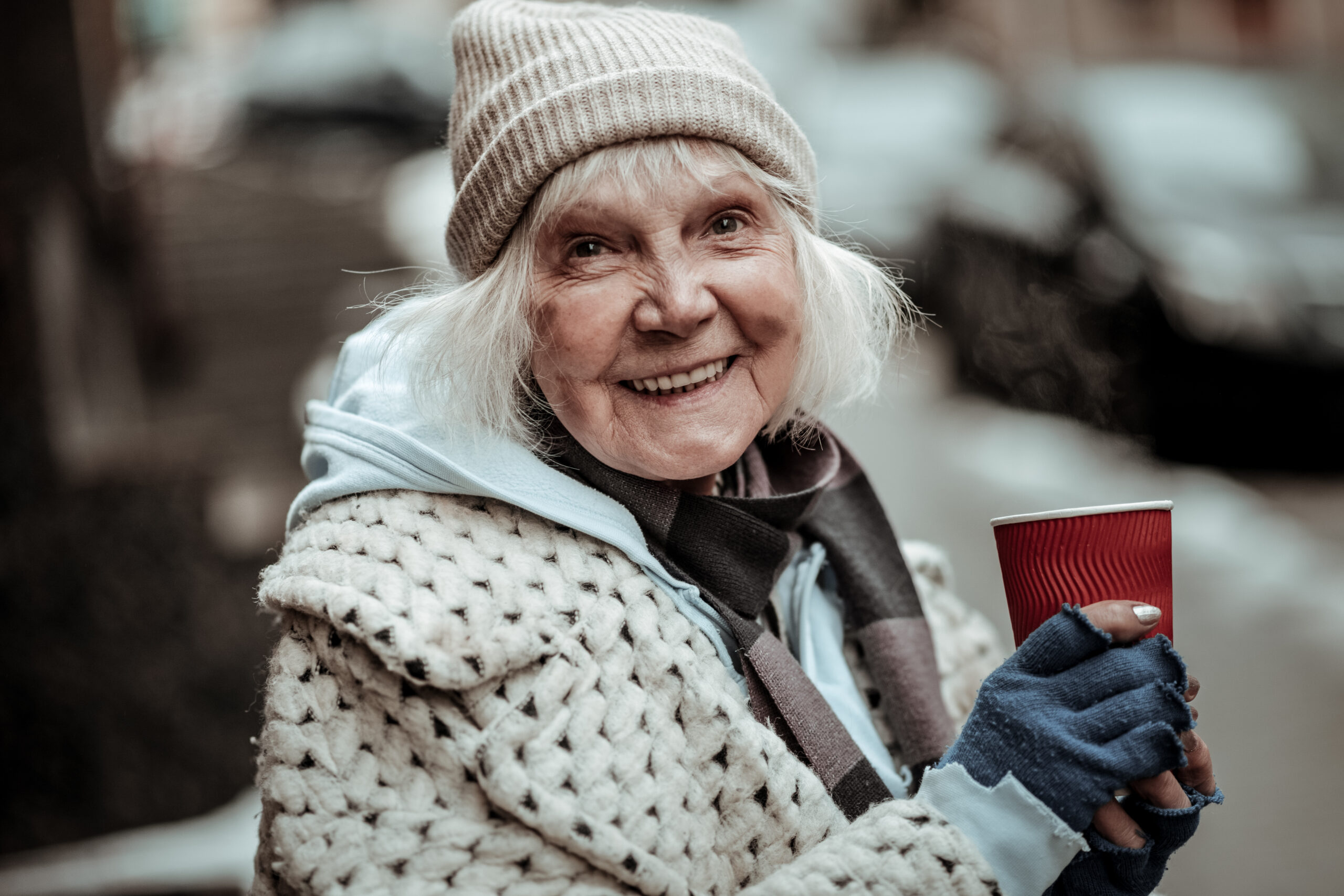 Portrait of a cheerful aged woman smiling