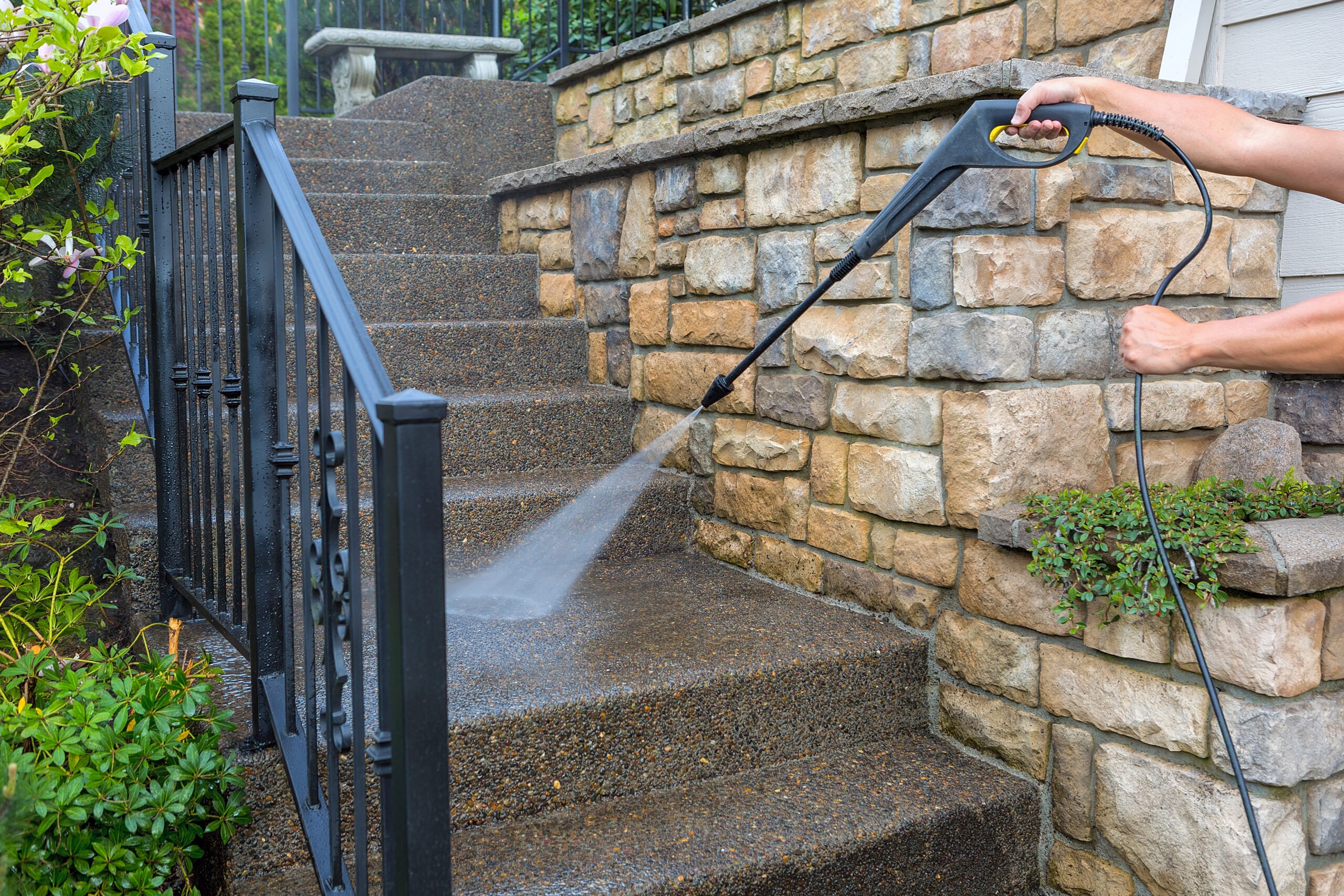 Washing the house front entrance stair steps