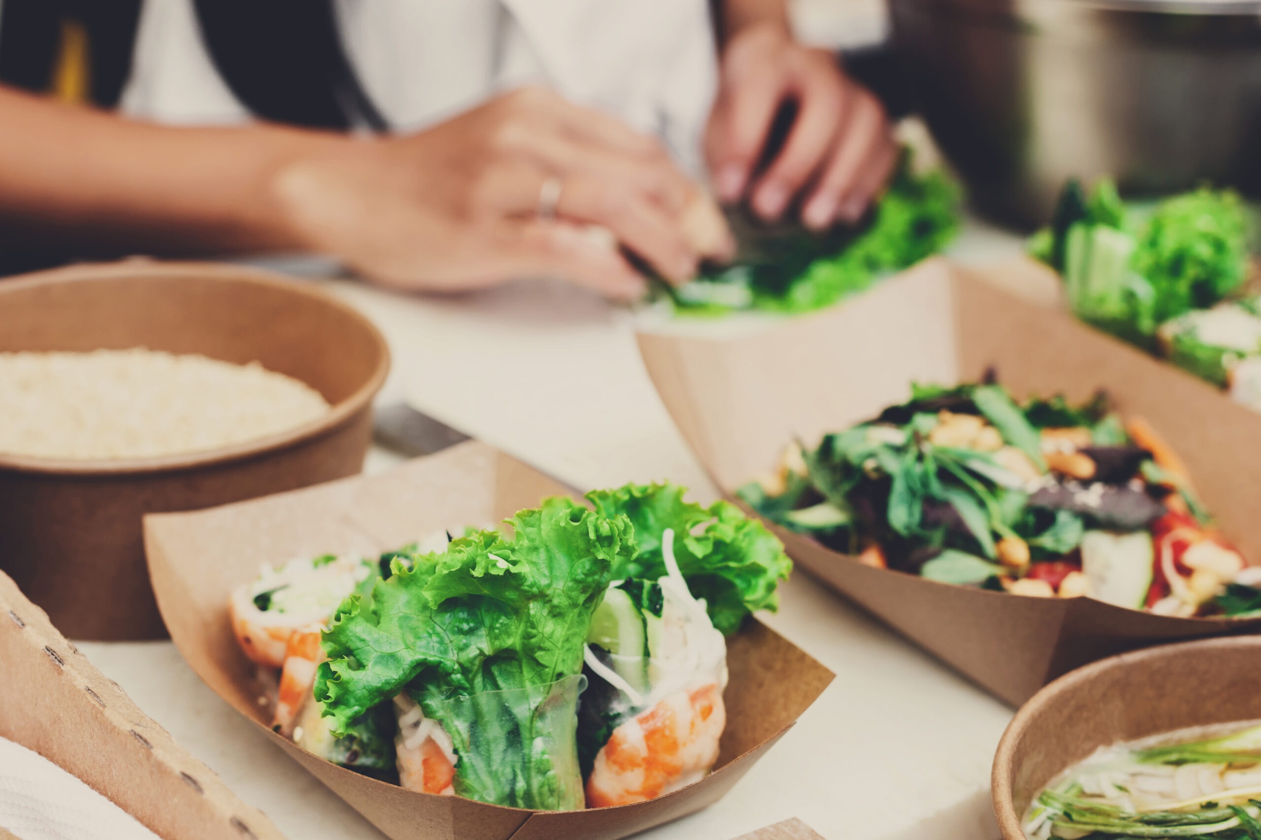 Vegetable salads in kraft paper plates